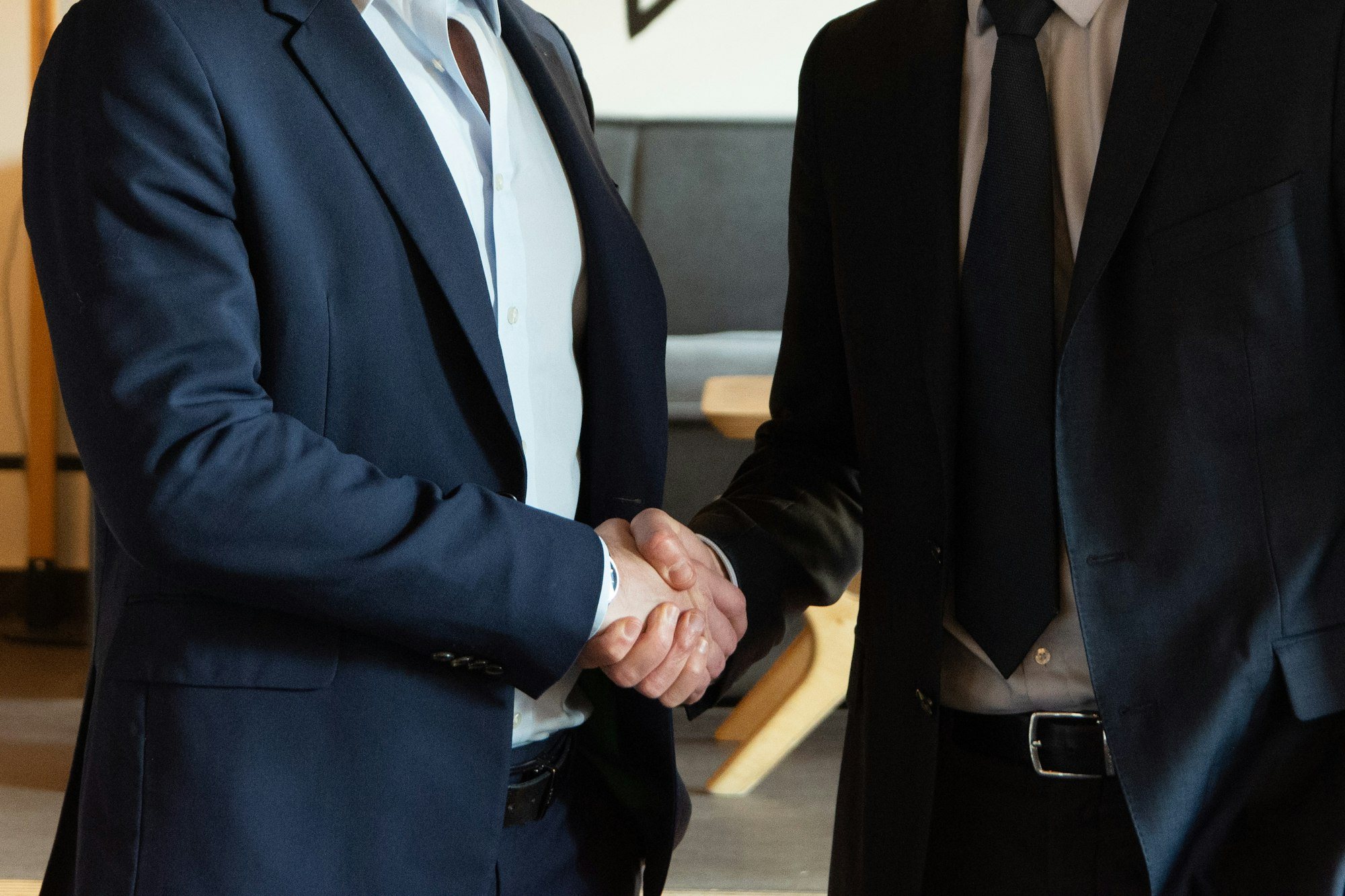 Candidate shaking hands with a recruiter after a job interview